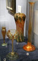 Gold iridescent glass vases & goblet by Louis Comfort Tiffany at Lyman Allyn Art Museum. New London, CT.