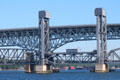 Interstate highway & rail lift bridge over Thames River as seen from Groton. Groton, CT.