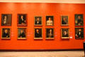 Portraits of local personages line wall of gallery at Mattatuck Museum. Waterbury, CT.