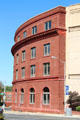 Curved brick facade of American Brass Company Building. Waterbury, CT.