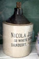 Stoneware jug marked M. McPhelemy & Co., Danbury, CT in Rider House at Danbury Museum & Historical Society. Danbury, CT.