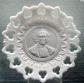 Opaque milk glass commemorative plate with image of Columbus at Knights of Columbus Museum. New Haven, CT.