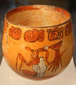 Classic Mayan ceramic polychrome jar painted with creator deity from Mexico at Dumbarton Oaks Museum. Washington, DC.