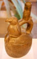Chimú ceramic stirrup-spout bottle with bird from Peru at Dumbarton Oaks Museum. Washington, DC.