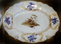 Porcelain serving platter painted with rooster from Tournai, France at Tudor Place. Washington, DC.