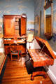 Mahogany desk & bookcase & grand harmonicon in Maryland period parlor at DAR Memorial Continental Hall. Washington, DC.