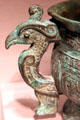 Detail of bird handle of Chinese bronze ritual food container in form of animal at Smithsonian Arthur M. Sackler Gallery. Washington, DC.
