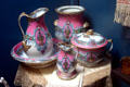 Pink & green wash basin & chamber pot set at Lightner Museum. St Augustine, FL.