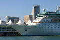 Bow of Majesty of the Seas cruise ship against skyline of Miami. Miami, FL