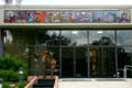 Mural covering Shakespeare characters over entrance to Lowndes Shakespeare Center. Orlando, FL.