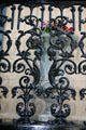 Cast iron balcony with flowers on West Perry St. off Chippewa Square. Savannah, GA.
