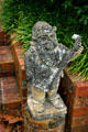 Gnome playing guitar in garden of Pebble Hill Plantation. Thomasville, GA.