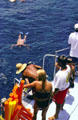 Snorkeling from cruise boat off Kona coast. Big Island of Hawaii, HI.
