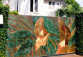 Artistic leaf patterns gates on Kealaolu Road in Waikiki. Waikiki, HI.
