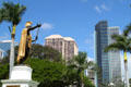 Statue of King Kamehameha with City Financial Tower & First Hawaiian Center. Honolulu, HI.
