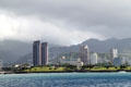 One Waterfront Towers & Keola Lai against Punchbowl crater & hills above Honolulu. Honolulu, HI.