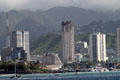 Honolulu skyline from sea with condo towers Royal Capitol Plaza, Imperial Plaza & Kauhale Kakaako. Honolulu, HI.
