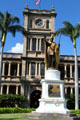 Ali'iolani Hale clock tower & King Kamehameha I statue. Honolulu, HI.