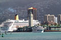 Cruise Ship & Aloha Tower against Honolulu