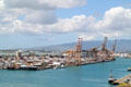 Container port cranes in Honolulu harbor. Honolulu, HI.