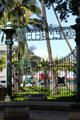 Original iron gates to H. Hackfeld & Co. in Walker Park at end of Fort St. Mall. Honolulu, HI.