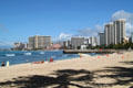 Skyline of Waikiki along shoreline from Hilton Village to Hyatt Regency Waikiki. Waikiki, HI.