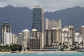 Trump International Hotel & Condos towers above surrounding highrises. Waikiki, HI.