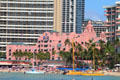 The pink Royal Hawaiian Hotel, most prominent landmark on Waikiki beach. Waikiki, HI.