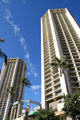 Hyatt Regency Waikiki Towers with octagonal pergola between. Waikiki, HI.