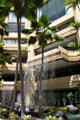 Waterfall within outdoor lobby of Hyatt Regency Waikiki. Waikiki, HI.