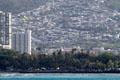 Kapi''olani Park against houses on hills seen from sea. Waikiki, HI.
