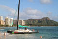 Maita'i Catamaran with Diamond Head beyond. Waikiki, HI.