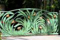 Artistic gate with golden heliconias for home east of Waikiki. Honolulu, HI.