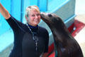Sea lion with trainer in Hawaii Ocean Theatre at Sea Life Park. HI.