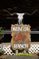 Kualoa Ranch sign with cattle skull. HI.