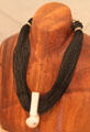 Lei Niho Palaoa Hawaiian chief's neck ornament replica at Kualoa Ranch. HI.