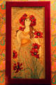 Art Nouveau embroidery of young woman with red flowers at Dodge House. Council Bluffs, IA.