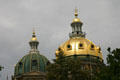 Two domes of Iowa State Capitol, one gold, one green. Des Moines, IA.