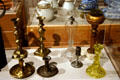 Candlesticks & oil lamps at Historical Museum of Iowa. Des Moines, IA.