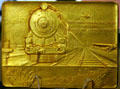 Brass medal to commemorate first combination train-air passenger service at Hoover Museum. West Branch, IA.