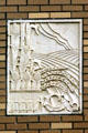 Art Deco relief of corn & wheat on Old Iowa City Press-Citizen Building. Iowa City, IA.