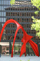 Flamingo sculpture by Alexander Calder in front of Federal Building which reflects Marquette Building. Chicago, IL.