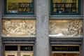 Bronze reliefs over doors of Marquette Building showing scenes of western explorations of Jacques Marquette & Louis Jolliet with quotes from their writings. Chicago, IL.
