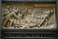 Bronze relief of Marquette being portaged by native Americans "Passing two leagues up the river we resolved to winter there being detained by my illness" on Marquette Building. Chicago, IL.