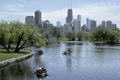 Skyline of Chicago from pond of Lincoln Park. Chicago, IL.