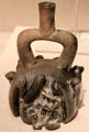 Chavín ceramic stirrup-spout vessel with feline & cactus from North Coast, Peru at Art Institute of Chicago. Chicago, IL.