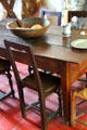 Straight back Ile d'Orleans chair & Petrin dough table in Old French House. Vincennes, IN.