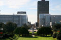 Bienville & Iberville buildings over front lawn of State Capitol. Baton Rouge, LA.
