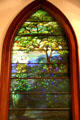Tiffany stained glass window of tree & lilies in St. James Episcopal Church. Baton Rouge, LA.