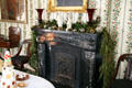 Dining room fireplace of Gallier House. New Orleans, LA.